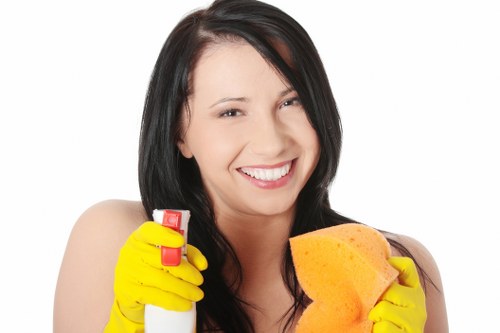 Cleaner reviewing a property risk assessment before cleaning